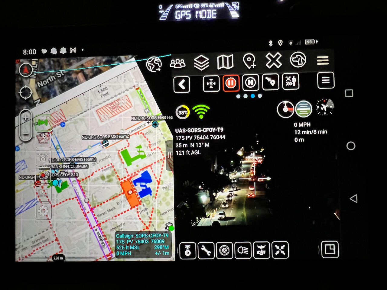 A screenshot with a custom map on one side and video of a street at night on the other